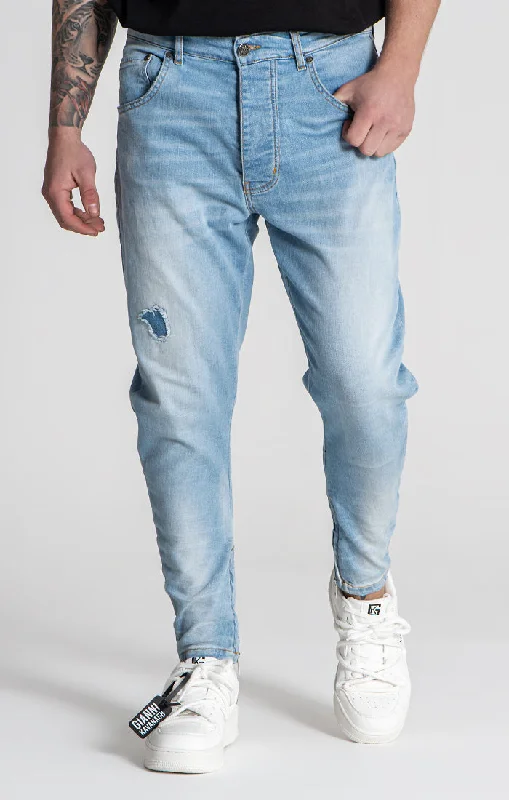 Men's Stretch Jeans with a Moisture - Wicking Lining for Active LifestylesLight Blue Distressed Zip Jeans Men's Stretch Jeans with a Moisture - Wicking Lining for Active LifestylesLight Blue Distressed Zip Jeans