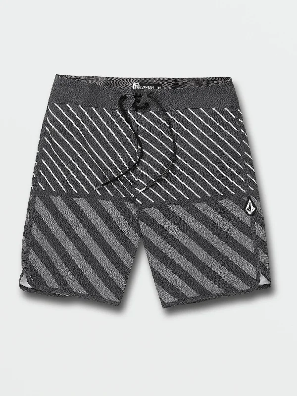 Men's Jeans with a Button - Fly for a Traditional and Classic AestheticQuarta Scallop Mod-Tech Trunks - Black Men's Jeans with a Button - Fly for a Traditional and Classic AestheticQuarta Scallop Mod-Tech Trunks - Black