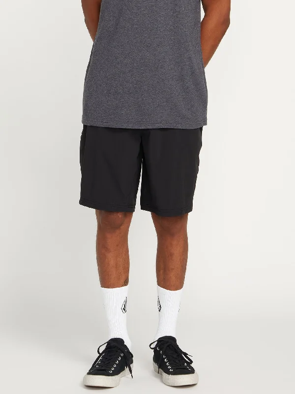 Men's Low - Rise Jeans in a Light Wash for a Casual and Youthful LookVoltripper Hybrid Shorts - Black Men's Low - Rise Jeans in a Light Wash for a Casual and Youthful LookVoltripper Hybrid Shorts - Black