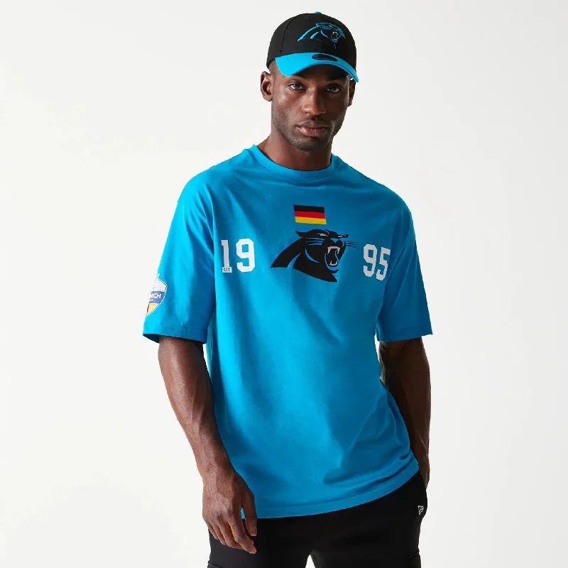 Men's long - sleeve henley t - shirts with button - down placketsCarolina Panthers NFL Games Square Arch Bright Blue Oversized T-Shirt Men's long - sleeve henley t - shirts with button - down placketsCarolina Panthers NFL Games Square Arch Bright Blue Oversized T-Shirt