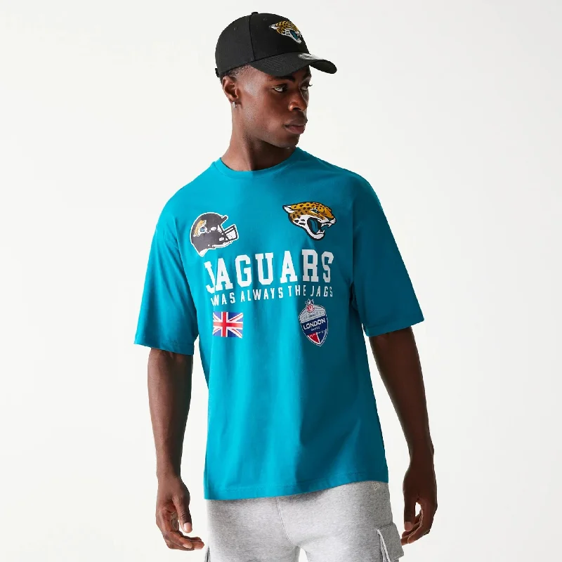 Men's distressed denim - look t - shirts with a rugged appealJacksonville Jaguars NFL Games Collegiate Turquoise Oversized T-Shirt Men's distressed denim - look t - shirts with a rugged appealJacksonville Jaguars NFL Games Collegiate Turquoise Oversized T-Shirt