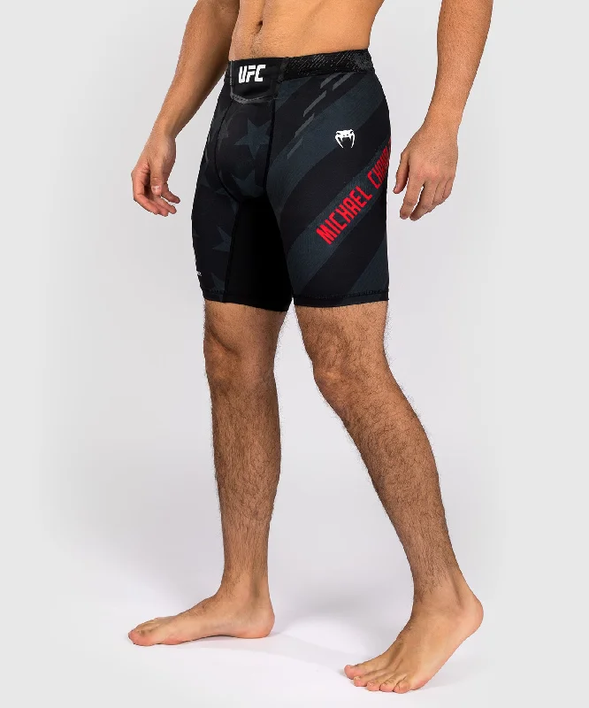 Men's adjustable - length convertible shorts for versatile useUFC Unrivaled by Venum Michael Chandler Men’s Vale Tudo Short - Black Men's adjustable - length convertible shorts for versatile useUFC Unrivaled by Venum Michael Chandler Men’s Vale Tudo Short - Black