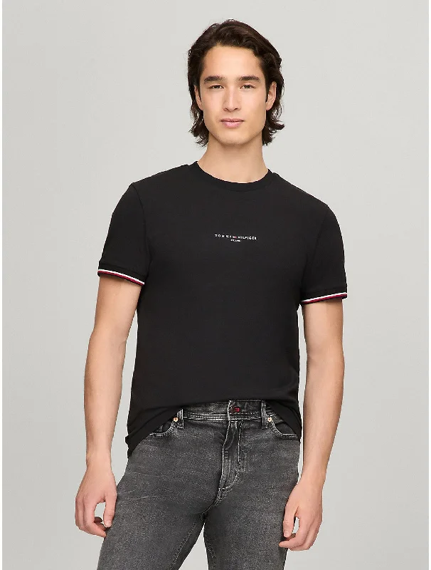 Men's distressed denim - look t - shirts with a rugged appealTommy Hilfiger Men's Tommy Logo Tipped Slim Fit T-Shirt Men's distressed denim - look t - shirts with a rugged appealTommy Hilfiger Men's Tommy Logo Tipped Slim Fit T-Shirt