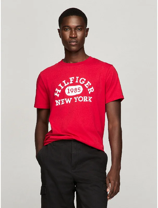 Men's distressed denim - look t - shirts with a rugged appealTommy Hilfiger Men's Varsity Monotype Logo T-Shirt Men's distressed denim - look t - shirts with a rugged appealTommy Hilfiger Men's Varsity Monotype Logo T-Shirt