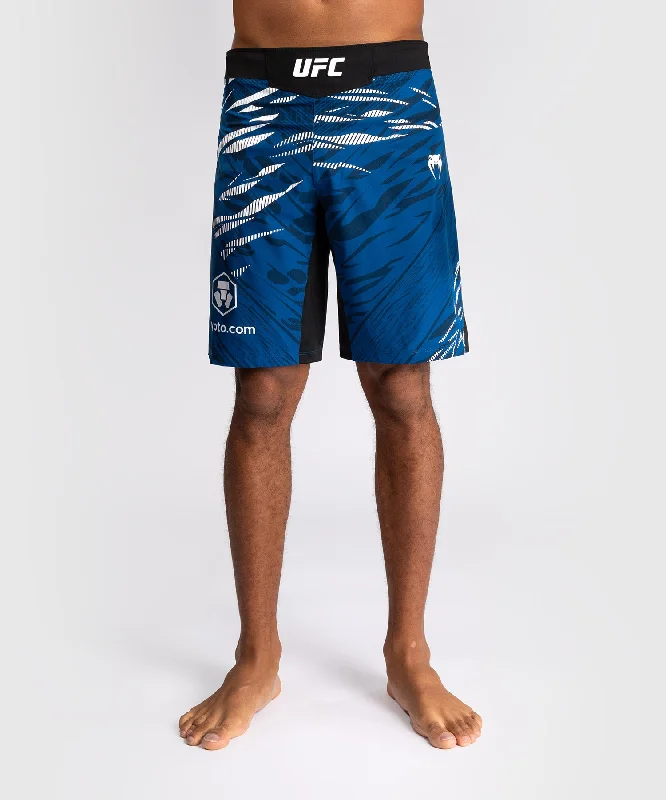 Men's side - stripe track shorts for a sporty running lookUFC Fusion by Venum Authentic Fight Night Men’s Fight Short - Long Fit - Blue Men's side - stripe track shorts for a sporty running lookUFC Fusion by Venum Authentic Fight Night Men’s Fight Short - Long Fit - Blue