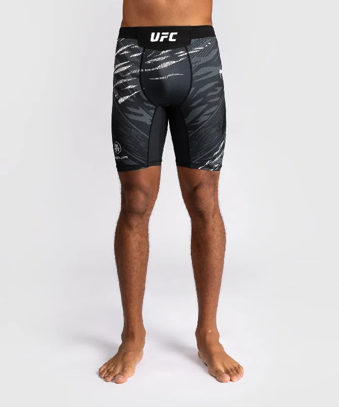 Men's ripped denim shorts for a trendy streetwear aestheticUFC Fusion by Venum Authentic Fight Night Men’s Vale Tudo Short - Black Men's ripped denim shorts for a trendy streetwear aestheticUFC Fusion by Venum Authentic Fight Night Men’s Vale Tudo Short - Black