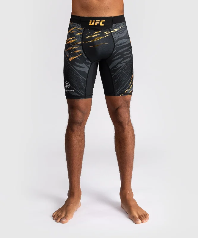 Men's adjustable - length convertible shorts for versatile useUFC Fusion by Venum Authentic Fight Night Men’s Vale Tudo Short - Champion Men's adjustable - length convertible shorts for versatile useUFC Fusion by Venum Authentic Fight Night Men’s Vale Tudo Short - Champion