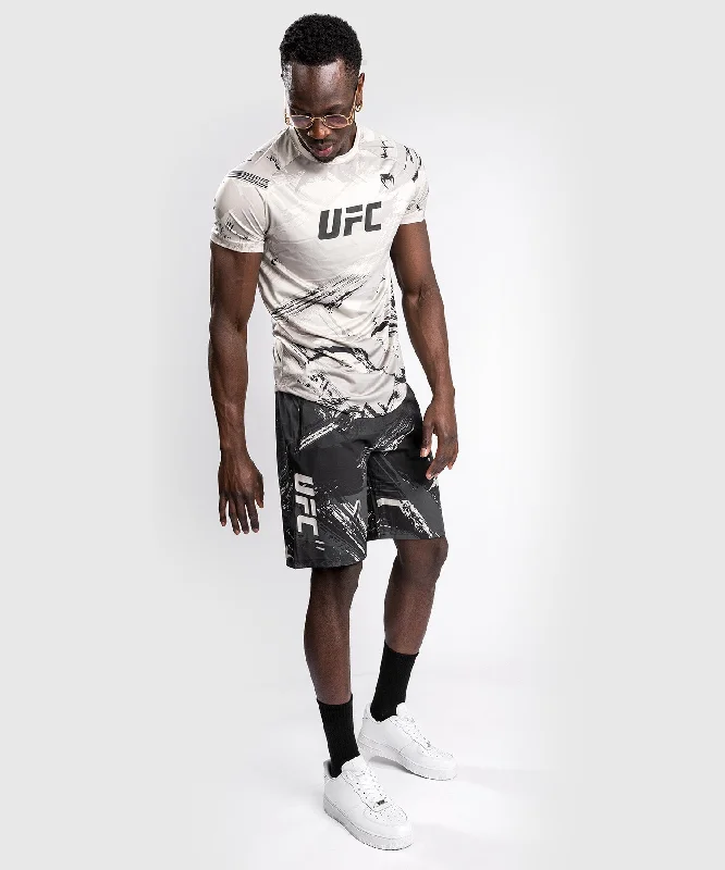 Men's side - stripe track shorts for a sporty running lookUFC Venum Authentic Fight Week 2.0 Men’s Performance Short - Black/Sand Men's side - stripe track shorts for a sporty running lookUFC Venum Authentic Fight Week 2.0 Men’s Performance Short - Black/Sand