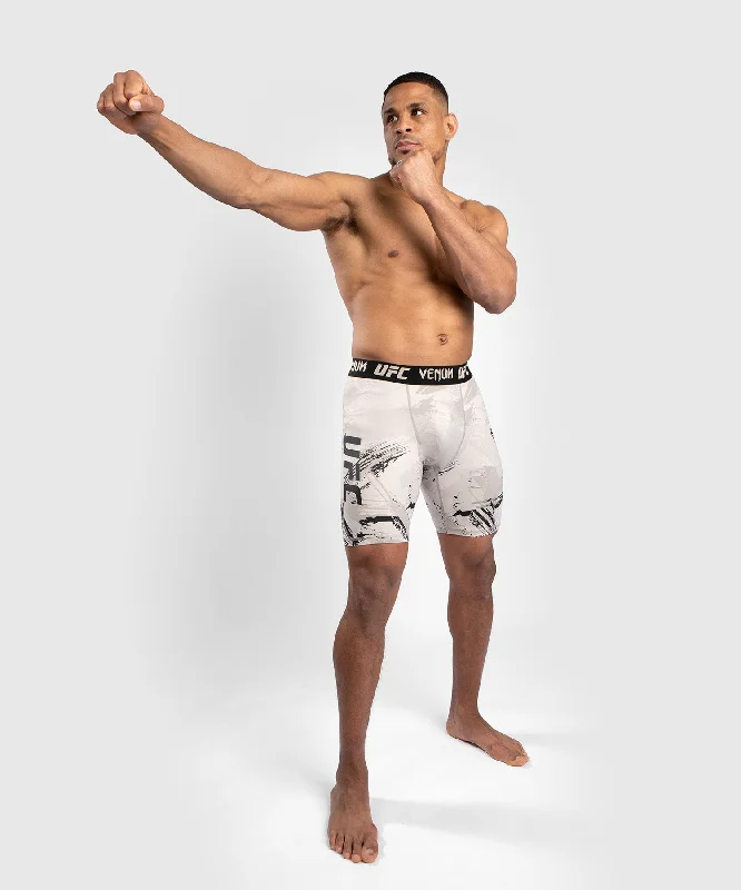 Men's pleated front twill shorts for a classic and sophisticated appearanceUFC Venum Authentic Fight Week 2.0 Men’s Vale Tudo Short - Black/Sand Men's pleated front twill shorts for a classic and sophisticated appearanceUFC Venum Authentic Fight Week 2.0 Men’s Vale Tudo Short - Black/Sand